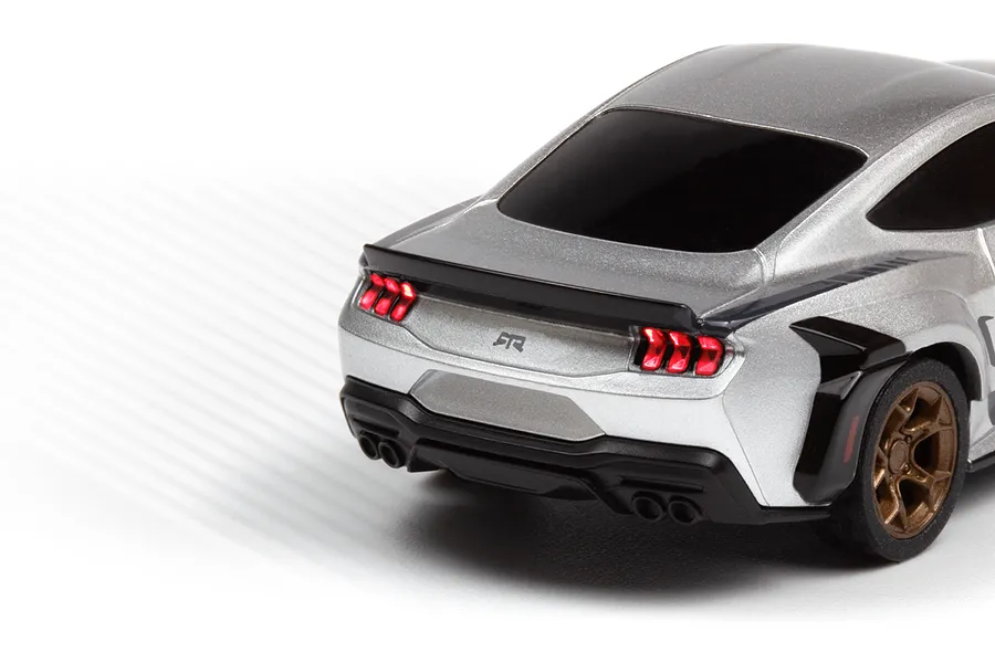 Close-up rear angle view of the silver HPI Nano-TTR Ford Mustang Spec 5 RC car showcasing illuminated red tail lights.