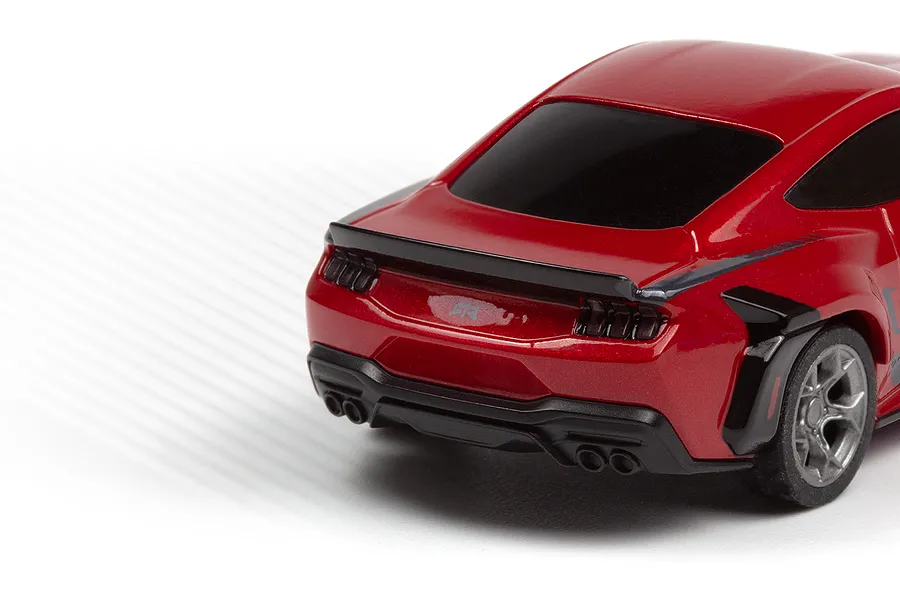 Close-up rear angle of the red HPI Nano-TTR Ford Mustang Spec 5 RC car showing the spoiler and exhaust detail.