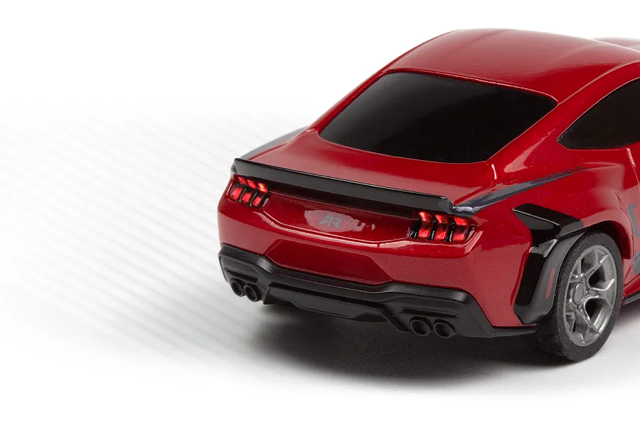 Rear-quarter view of the red HPI Nano-TTR Ford Mustang RC car, highlighting taillights and spoiler.
