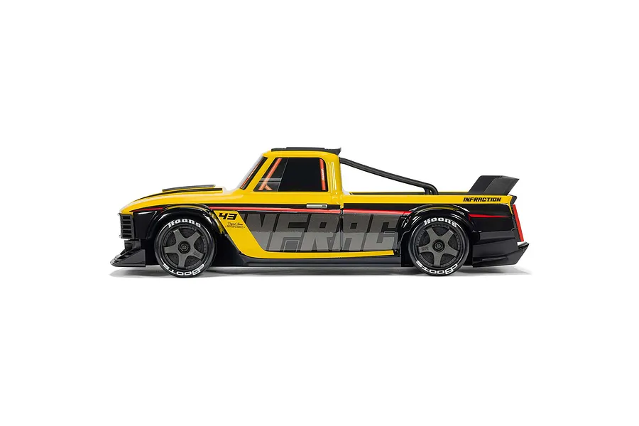 Studio side profile view of the yellow ARRMA Infraction Grom 3S RC street bash truck on a white background.
