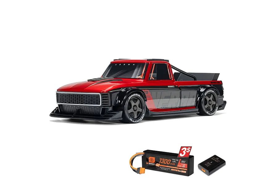 ARRMA Infraction Grom 3S red electric RC street bash truck with included 3S LiPo battery and USB charger.