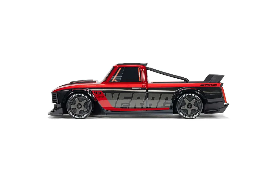 Studio side profile shot of the ARRMA Infraction Grom 3S electric RC car in red and black with custom street styling.