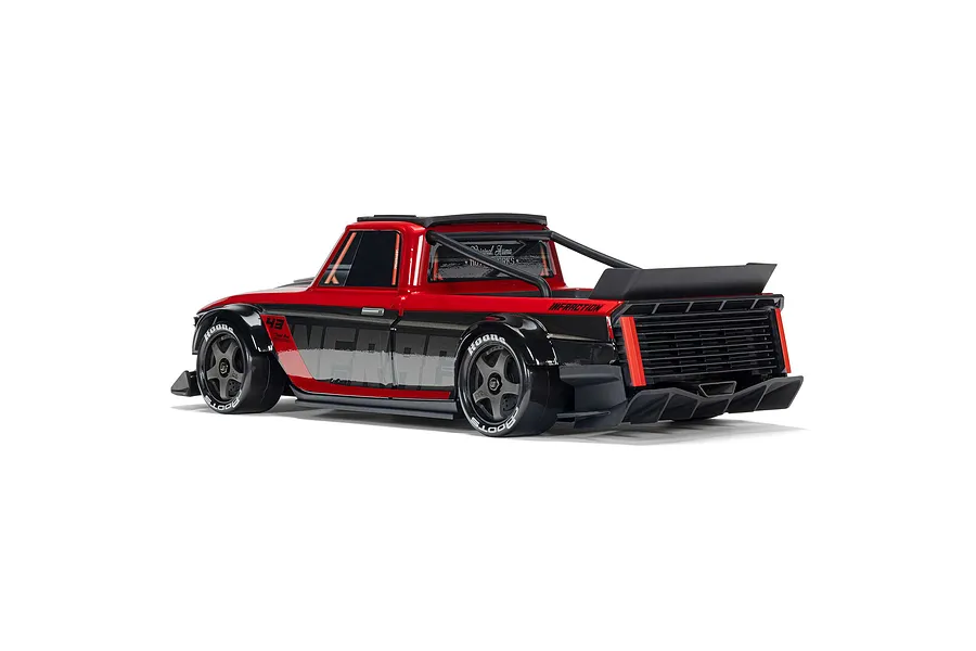 Rear-three-quarter studio shot of the ARRMA Infraction Grom 3S red and black RC street basher car against a plain white background.