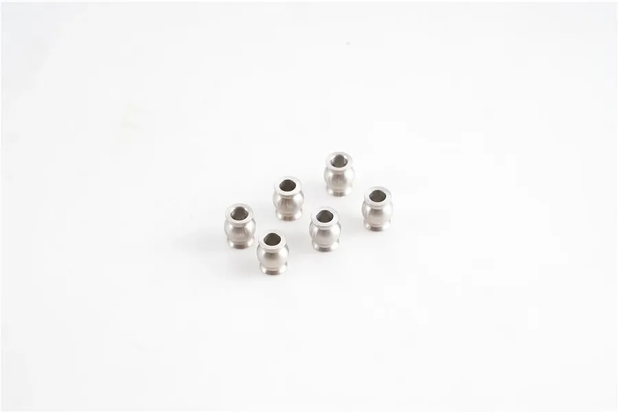 A set of six silver metal pivot balls arranged on a plain white studio background.