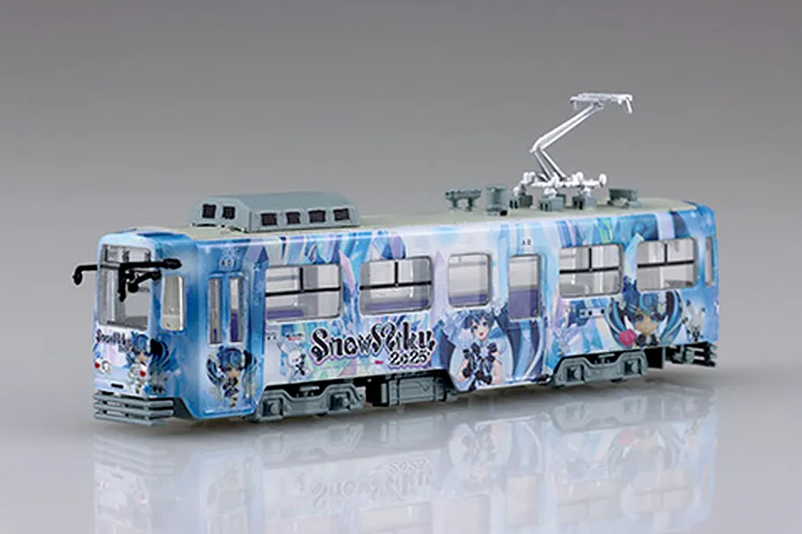 Fujimi 1/150 scale Yuki Miku Train 2025 model showing blue anime character graphics and a pantograph on a white background.
