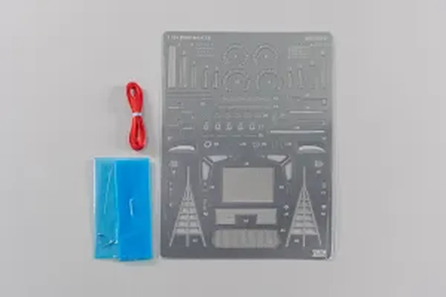 NuNu 1/24 BMW M6 GT3 detail up parts set including a photo-etched metal sheet, red cord, and blue material on a white background.