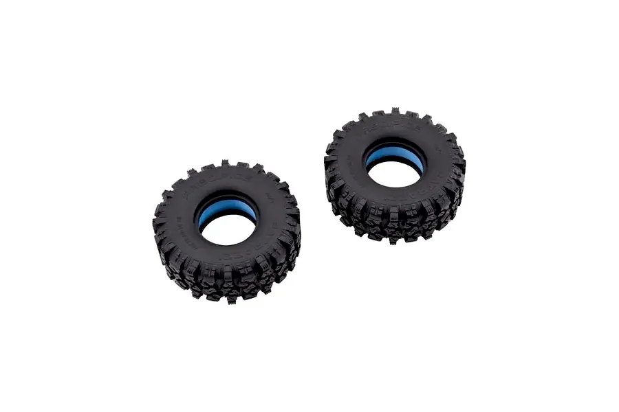 Studio shot of two black FMS 1/10 FCX10 Pro LC80 RC crawler tyres with blue foam inserts visible on a white background.