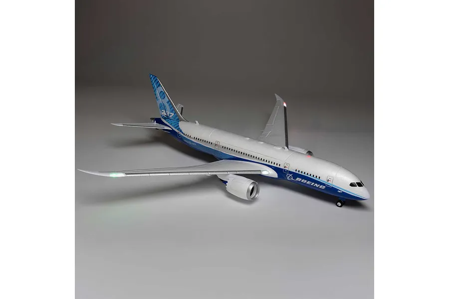 E-Flite Micro Boeing 787 Dreamliner RC plane shown from a high front-three-quarter angle against a grey studio background.