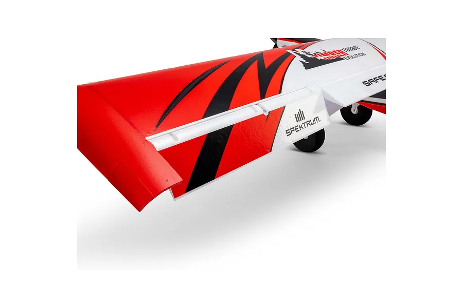 Close-up of the red, white, and black wing and aileron of the E-Flite Turbo Timber Evolution RC plane.