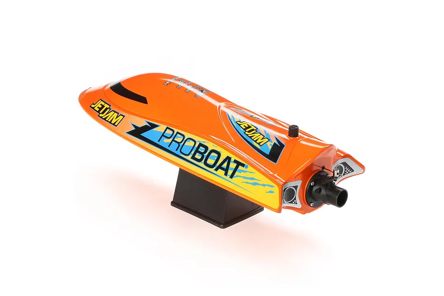 Pro Boat Jet Jam V2 12-inch electric RC speed boat in orange, mounted on a black plastic display stand against a white background.
