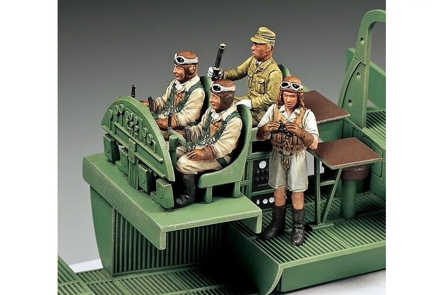A detailed scale model of a Mitsubishi G4M1 cockpit interior with four painted crew figures including Admiral Yamamoto.