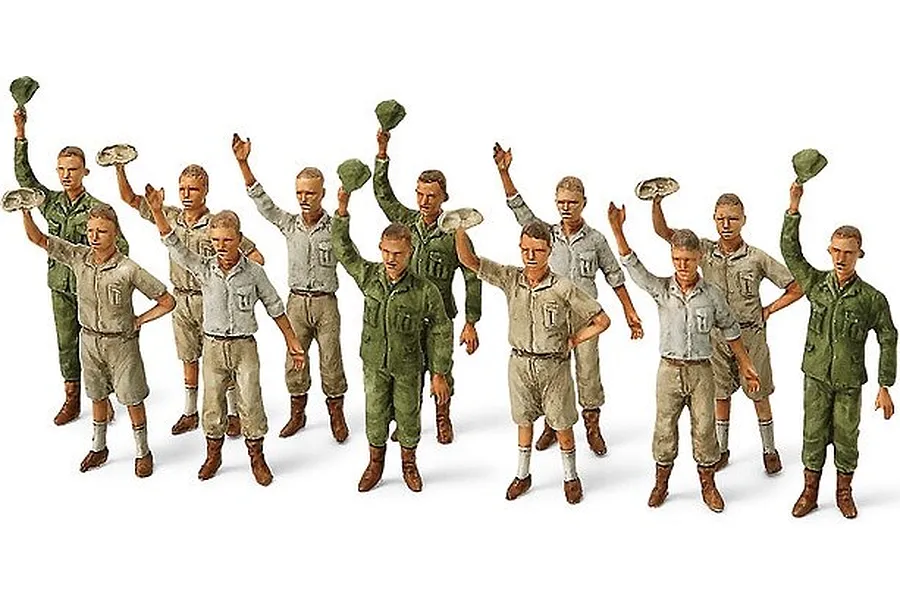 A group of ten painted 1/48 scale plastic model figures of Japanese ground crew waving caps, included with the Tamiya Mitsubishi G4M1 model kit.
