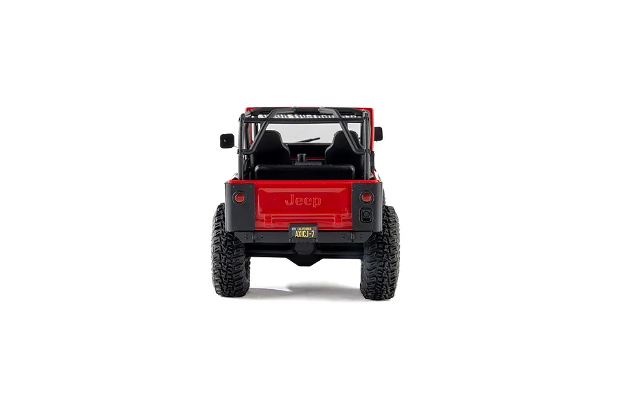 Rear view of the Axial SCX30 Jeep CJ-7 Renegade red RC rock crawler on a white background.