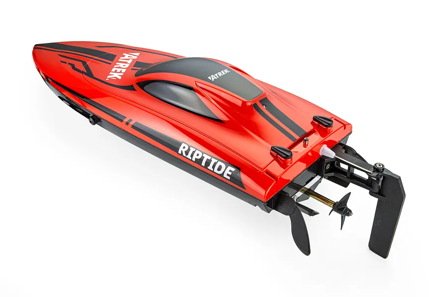 Atrek Riptide 16-inch red RC speed boat seen from a rear high-angle studio view, showing the rudder, propeller, and hull details.