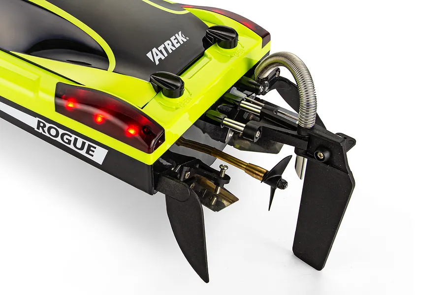 Close-up rear view of the Atrek Rogue green RC speed boat, showing the rudder, propeller, and hardware setup on white background.