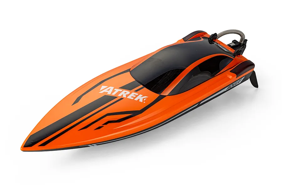 Atrek Rogue orange and black deep V RC speed boat shown from a high-angle studio shot against a white background.