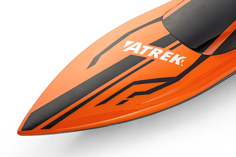 Close-up of the orange hull bow section of the Atrek Rogue 22 inch RC speed boat with black graphics and the Atrek brand logo.