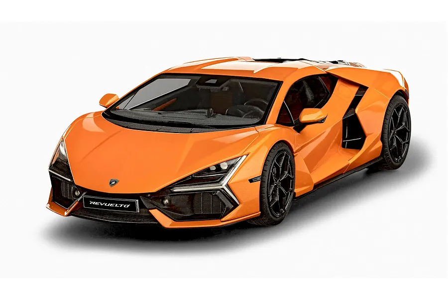 Studio shot of an assembled and painted orange Revell 1/24 Lamborghini Revuelto model car on a white background.