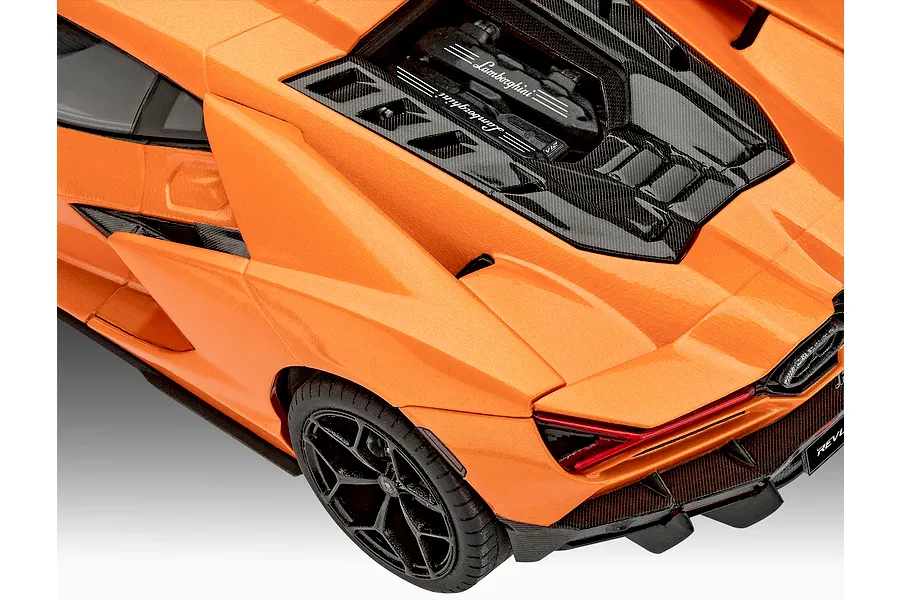 Close-up angled view of the rear and engine cover of the Revell 1/24 scale Lamborghini Revuelto model car in orange.