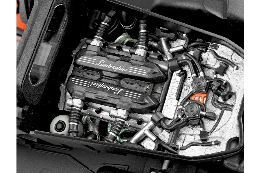 Detailed top-down view of the scale model engine bay for the Revell 1/24 Lamborghini Revuelto model car.