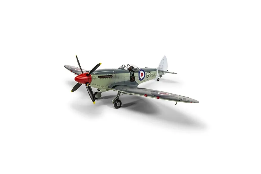 Completed Airfix 1/48 Supermarine Seafire F.XVII plastic model fighter aircraft in green and grey camouflage.