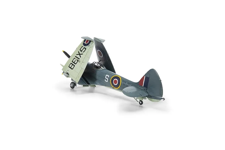 Completed Airfix 1/48 Supermarine Seafire F.XVII plastic model aircraft with folded wings on a white background