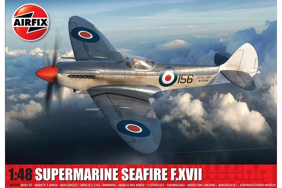 Airfix 1/48 Supermarine Seafire F.XVII model kit box art showing a fighter aircraft flying above clouds.