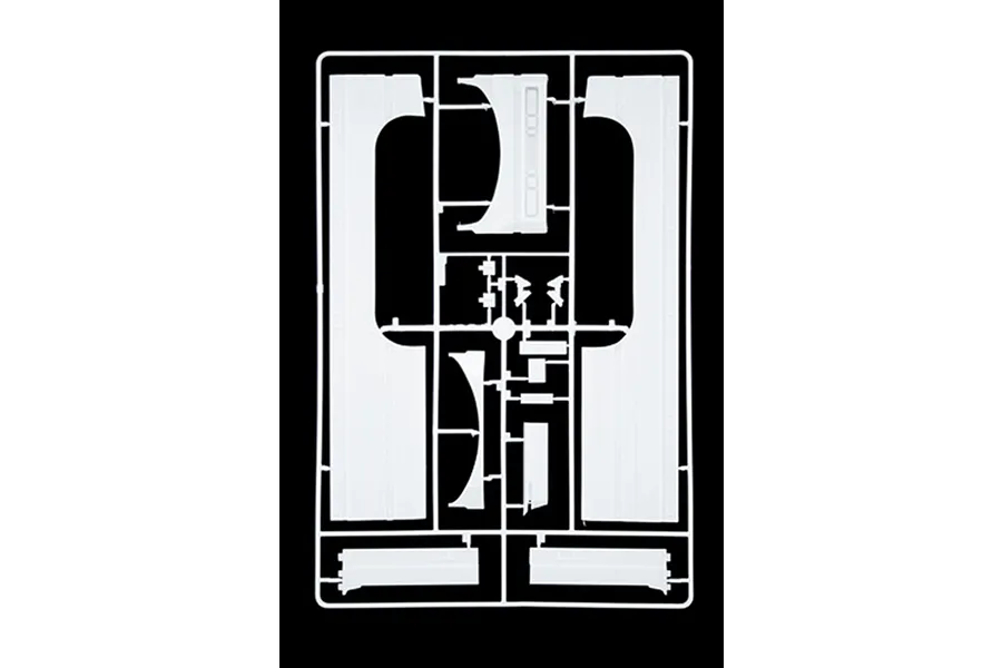 White plastic model kit parts sprue containing large flat panels and structural components on a black background.