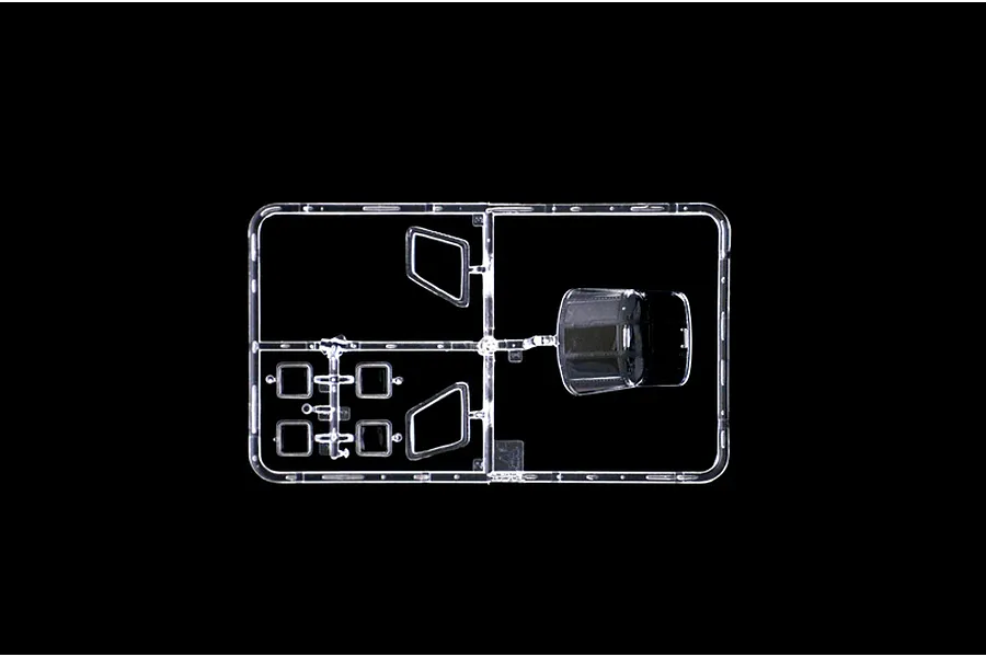 Clear plastic model kit sprue containing windows and canopy parts for an Italeri 1/48 scale helicopter model.