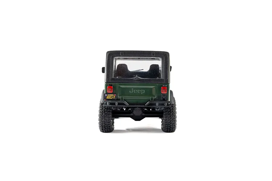 Rear view of the green Axial SCX30 Jeep CJ-7 Renegade RC rock crawler on a white background.