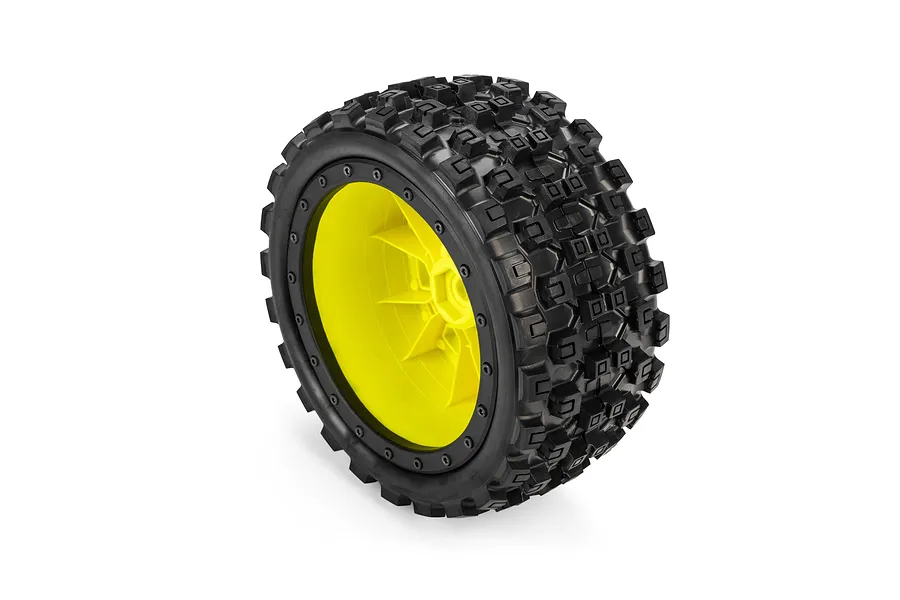 Studio product shot of a Pro-Line 1/5 Badlands MX43 Pro-Loc tyre mounted on a yellow and black Impulse wheel against a white background.