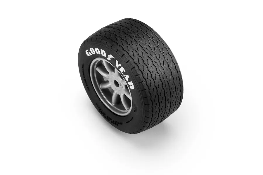 Pro-Line Goodyear Blue Streak VTA RC tyre and grey rim mounted wheel viewed from an angle on a white background.