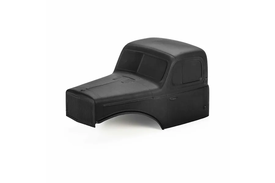 Pro-Line matte black painted cab-only crawler body shell against a white studio background.