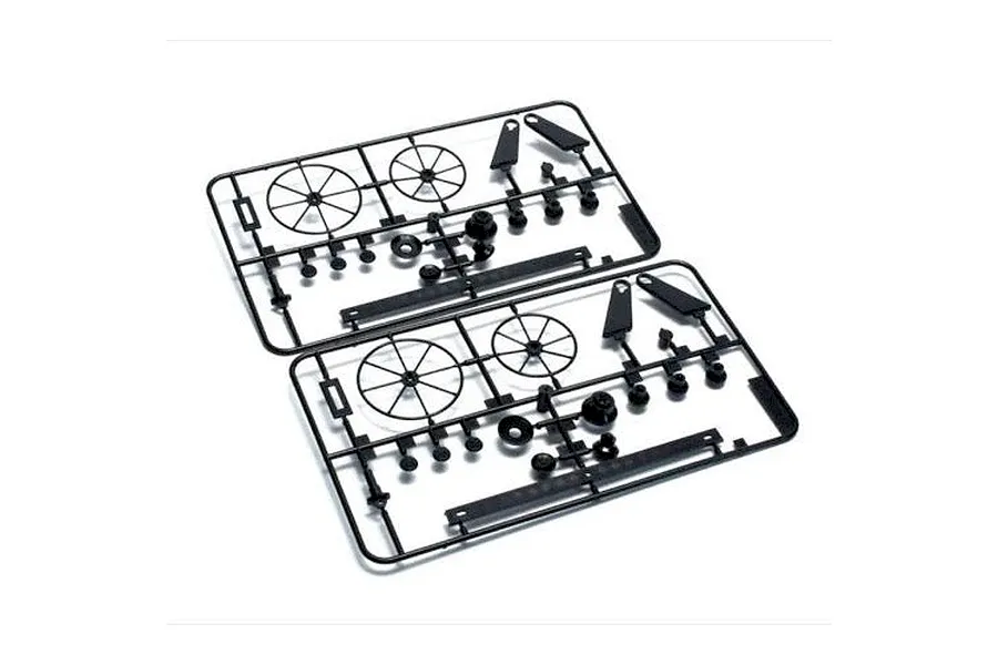 Two identical black plastic parts trees containing wheels, rudders, and small components on a white background.