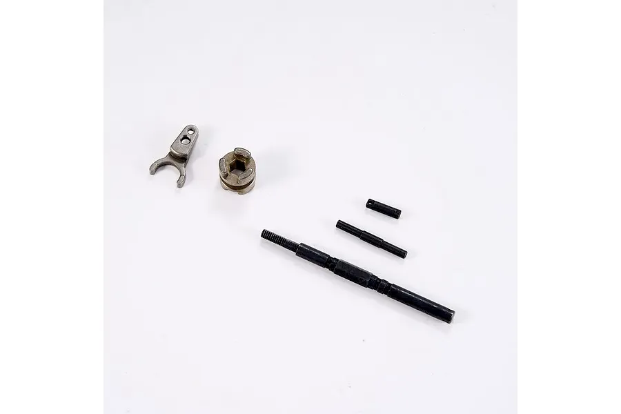 FMS V2 Clutch Engage Switcher parts including shift fork, collar, shafts, and pins laid out on a white surface.