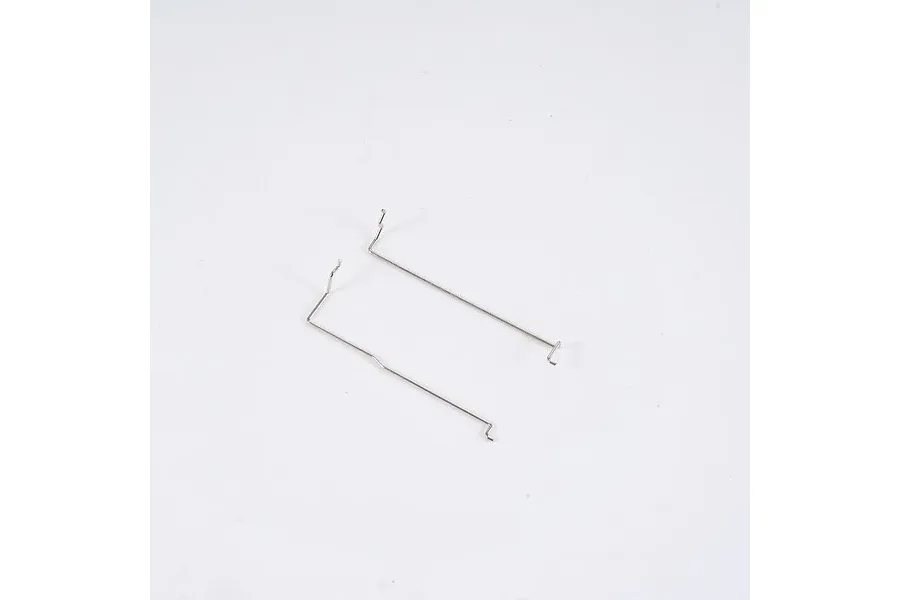 Two metal shift and drive linkages shown against a plain white studio background.
