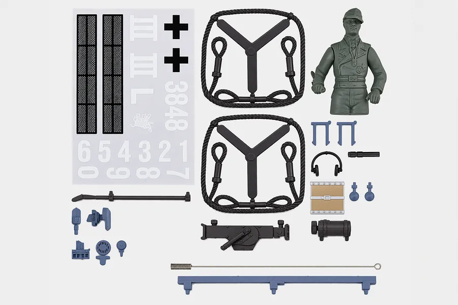 Heng Long 1/16 German Panzer III Type L tank accessory pack laid out on a white surface, including decals, commander figure, and scale parts.