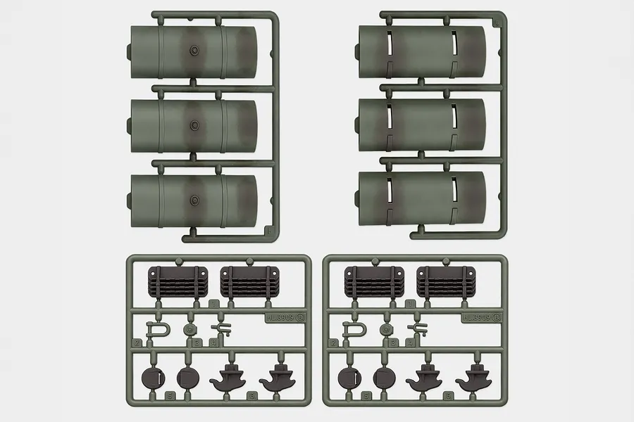 Heng Long T-34/85 tank accessory parts on green plastic sprues including fuel drums and details.