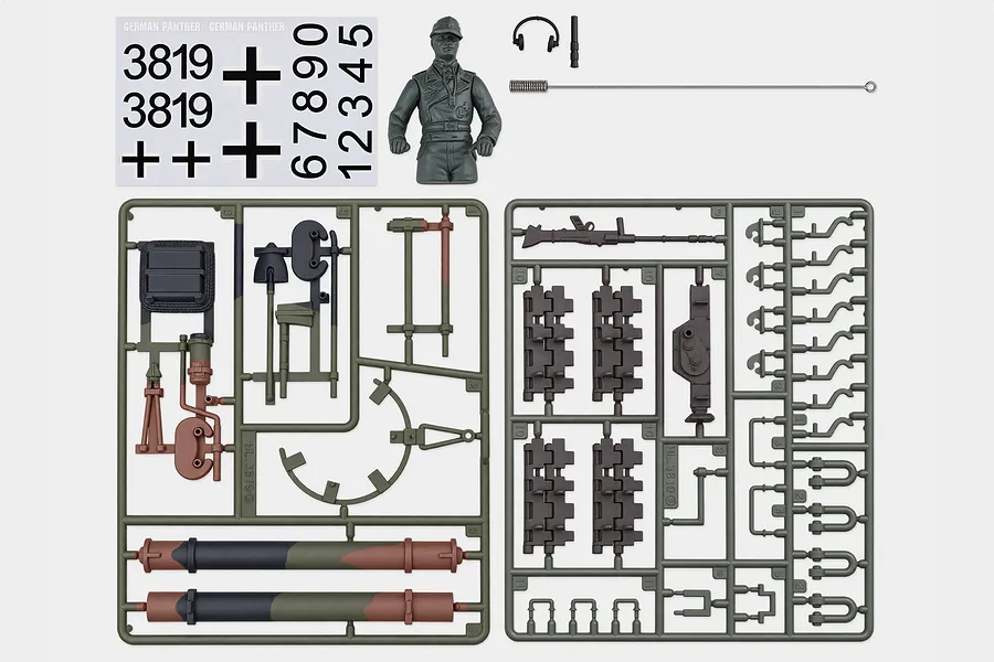 Heng Long German Panther Tank accessory pack featuring plastic parts sprues, decal sheet, commander figurine, and metal antenna.