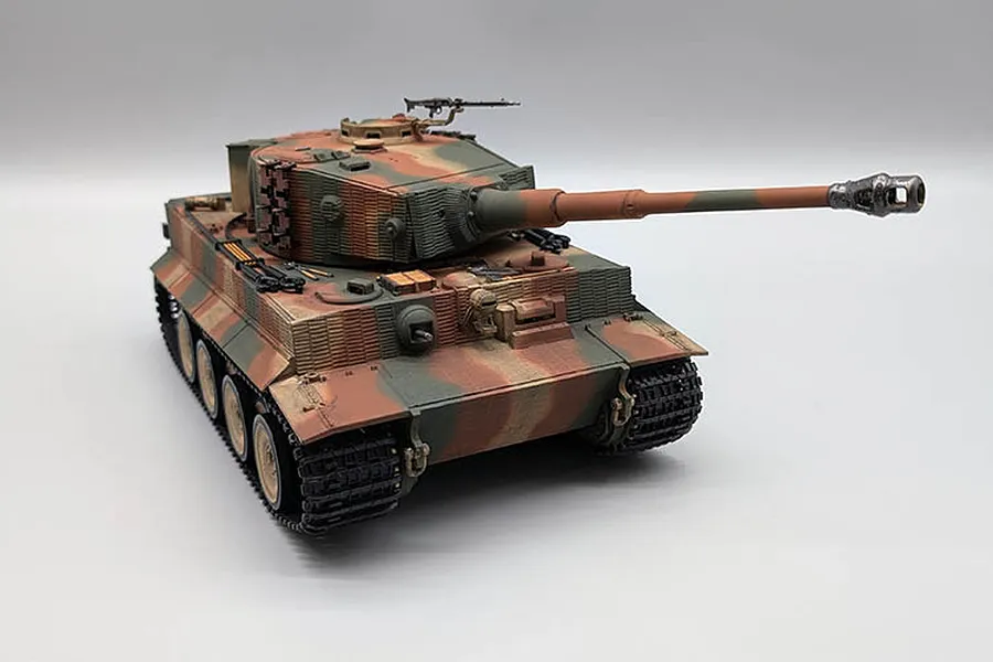 Taigen German Tiger I RC tank in 1/24 scale with a multi-colour camouflage paint scheme on a light grey background.