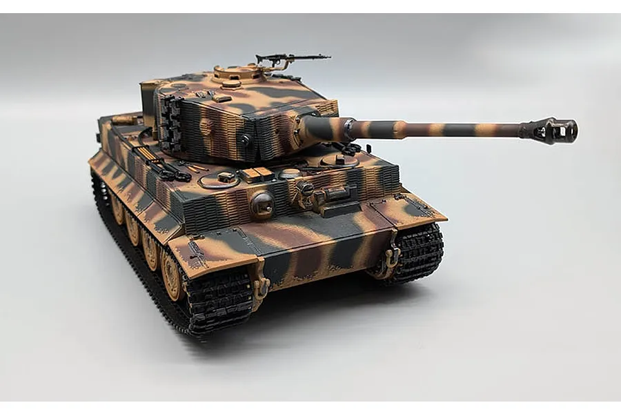 Studio product photo of a Taigen German Tiger I RC tank with camouflage paint, seen from a high-angle front view.