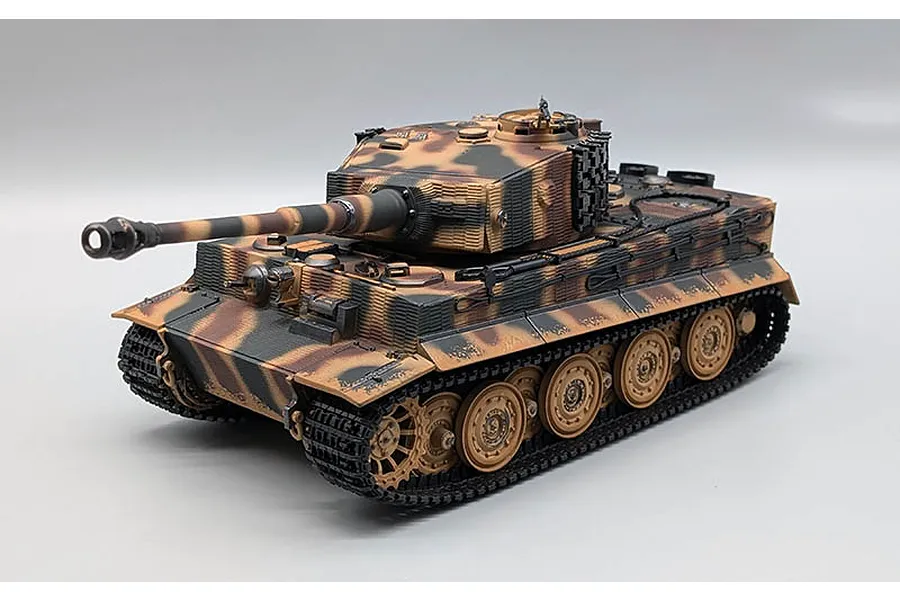 Taigen German Tiger I RC tank with camouflage paint, showing side profile against a white studio background.