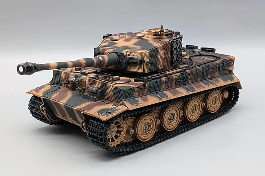 Studio product shot of Heng Long German Tiger I RC tank with camouflage paint, black tracks, and detailed turret.