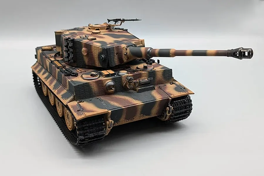 Heng Long German Tiger I RC tank in camouflage finish shown from a high front angle against a white background.