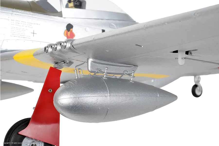 Close-up of the silver wing and drop tank on the Arrows RC P-51 Mustang 850mm warbird model airplane.