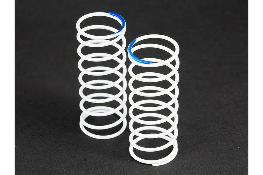 Two white ARRMA RC shock springs with blue identification markings on a black background.