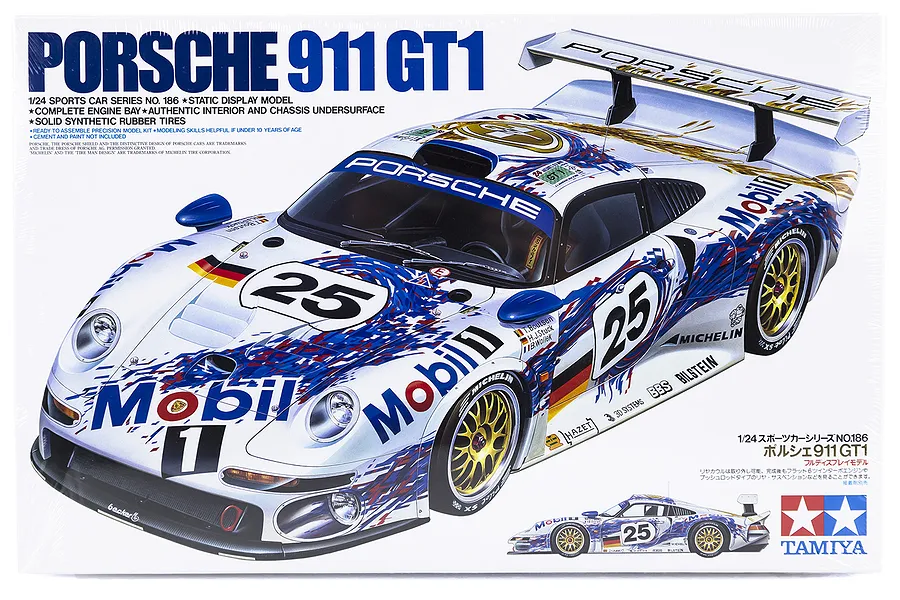 Tamiya 1/24 scale Porsche 911 GT1 model kit box art showing a white race car with blue and red Mobil 1 livery.