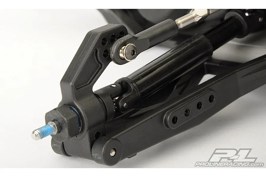 Close-up of a Pro-Line rear hub assembly installed on an RC vehicle suspension arm.