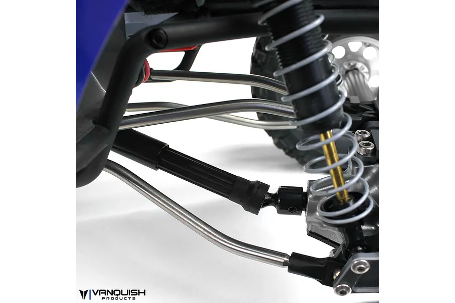 Close-up of the suspension and titanium linkage setup on a Vanquish RC crawler chassis.