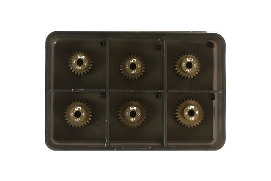 A set of six Yeah Racing hard-coated aluminium pinion gears in a black plastic storage case, labeled 21T through 26T with 48P markings.